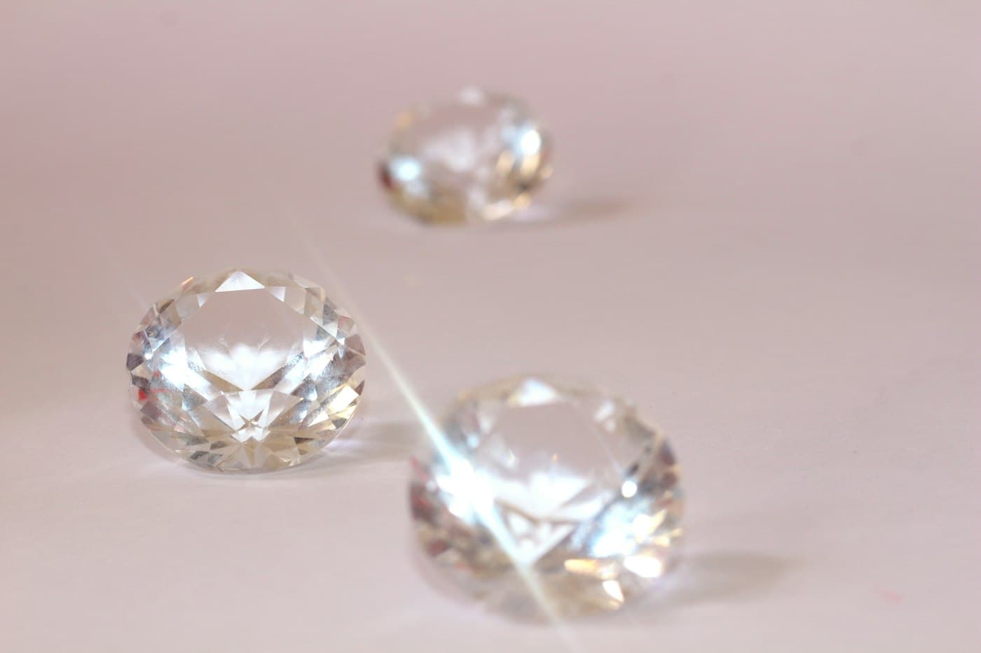 Loose laboratory-grown diamonds in pear, emerald and marquise shapes