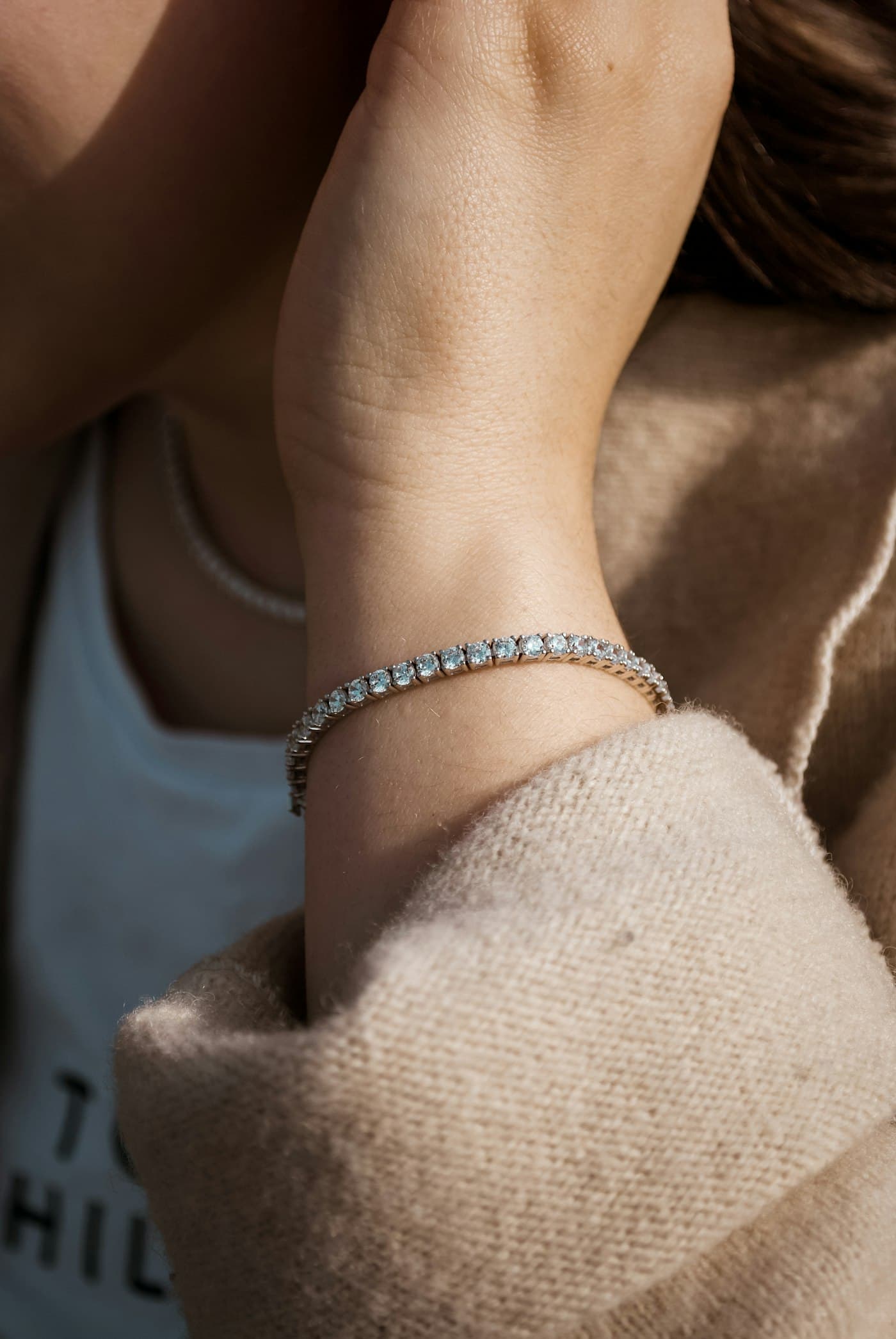 Laboratory-grown diamond tennis bracelet on a wrist